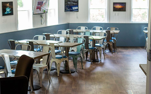 Interior, rows of tables and chairs